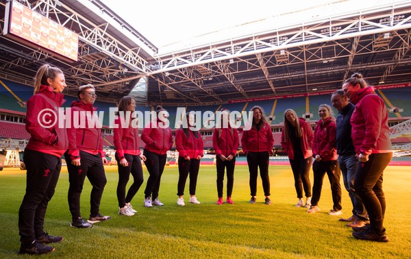 120122 - Welsh Rugby Union Women's Rugby Contracts - The first members of the Welsh Rugby Union Women's squad to be given full time contracts during the announcement at the Principality Stadium Left to right, Elinor Snowsill, Donna Rose, Lisa Neumann, Carys Phillips, Ffion Lewis, Hannah Jones, Natalia John, Alisha Butchers, Kiera Bevan and Siwan Lillicrap with WRU Group Chief Executive Steve Phillips