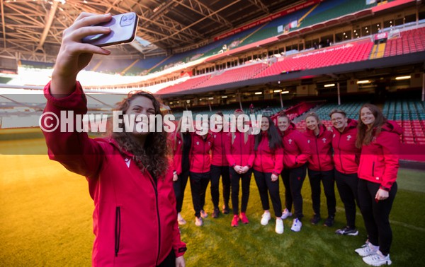 120122 - Welsh Rugby Union Women's Rugby Contracts - Natalia John takes a selfie of herself and the other players as the Welsh Rugby Union announce the first 12 Women's full time contracts for international players at the Principality Stadium Left to right, Alisha Butchers, Kiera Bevan, Siwan Lillicrap, Hannah Jones, Ffion Lewis, Carys Phillips, Elinor Snowsill, Donna Rose and Lisa Neumann