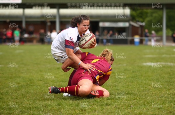 200517 - WRU Women's Super Cup Finals Day - Caernafon v Swansea - Cup Final -  Siwan Lilicrap of Swansea is tackled by Gwenllian Pyrs of Caernarfon 