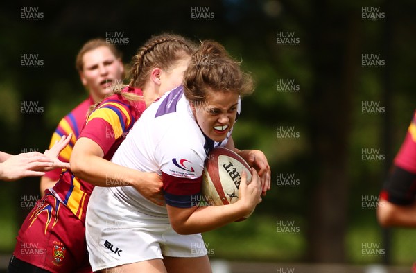 200517 - WRU Women's Super Cup Finals Day - Caernafon v Swansea - Cup Final -  Kate Jones of Swansea is tackled by Elin Royle of Caernarfon 