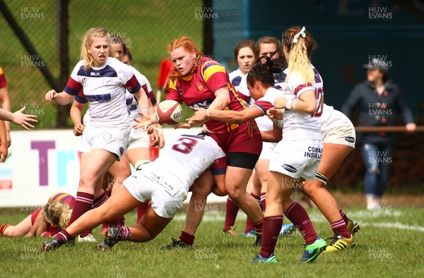 200517 - WRU Women's Super Cup Finals Day - Caernafon v Swansea - Cup Final -  Brea Leung of Caernafon offloads from the tackle by Amy Evans of Swansea 