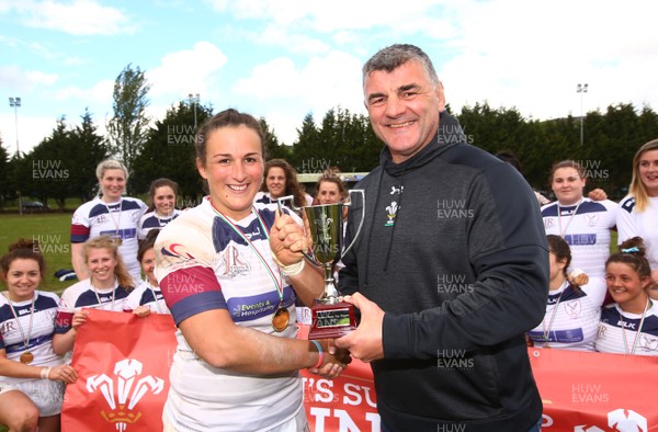 200517 - WRU Women's Super Cup Finals Day - Caernafon v Swansea - Cup Final -  Captain of Swnasea Siwan Lilicrap receives the cup from Roland Phillips 