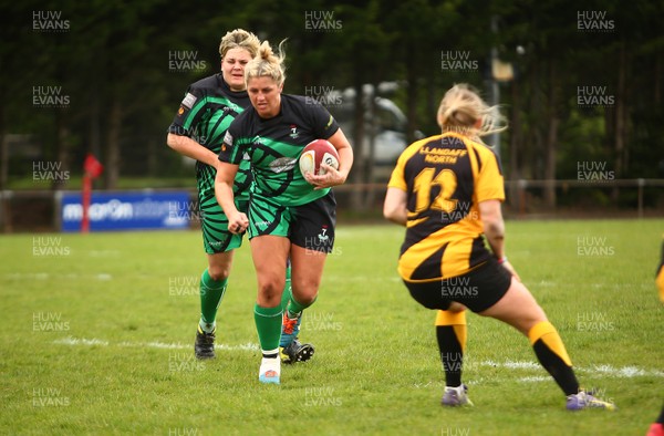 200517 - WRU Women's Super Cup Finals Day -  Llandaff North v Seven Sisters - Plate Final -  Anthonia Williams of Seven Sisters takes on Elin Huxtable of Llandaff North gets the ball away 