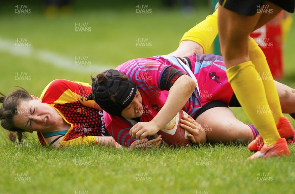 200517 - WRU Women's Super Cup Finals Day - Wattstown v Cardiff Quins - Youth Cup Final -  Ffion Revill of Cardiff Quins crashes over to score a try