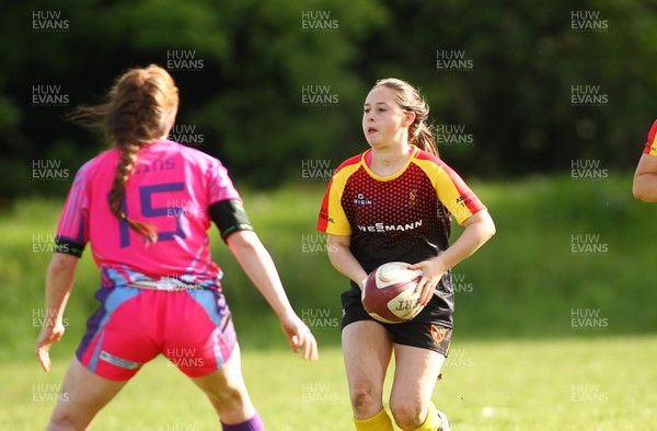 200517 - WRU Women's Super Cup Finals Day - Wattstown v Cardiff Quins - Youth Cup Final -  Celyn Harding of Wattstown takes on Rhian Gower of Cardiff Quins 