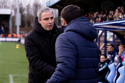 010126 - Wycombe Wanderers v Cardiff City - Sky Bet League 1 - Michael Duff manager of Wycombe Wanderers greets Brian Barry-Murphy manager of Cardiff City