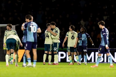 010126 - Wycombe Wanderers v Cardiff City - Sky Bet League 1 - Players greet each other after the final whistle