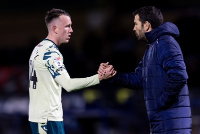 010126 - Wycombe Wanderers v Cardiff City - Sky Bet League 1 - Brian Barry-Murphy manager of Cardiff City shake hands with David Turnbull of Cardiff City