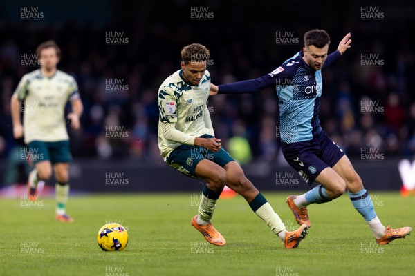 010126 - Wycombe Wanderers v Cardiff City - Sky Bet League 1 - Omari Kellyman of Cardiff City is challenged by Daniel Harvie of Wycombe Wanderers 