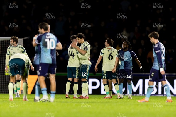010126 - Wycombe Wanderers v Cardiff City - Sky Bet League 1 - Players greet each other after the final whistle