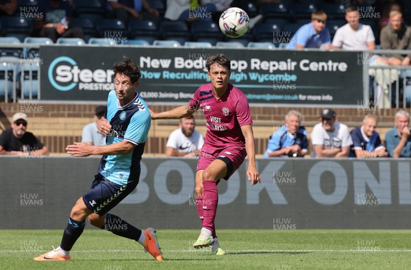 290723 - Wycombe Wanderers v Cardiff City, Pre-season Friendly - Perry Ng of Cardiff City crosses the ball