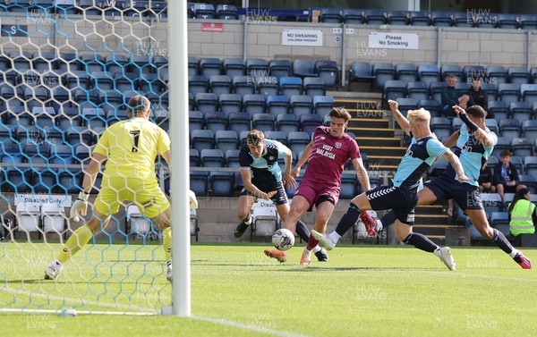 290723 - Wycombe Wanderers v Cardiff City, Pre-season Friendly - Ollie Tanner of Cardiff City looks to get a shot at goal as the Wycombe defence closes in
