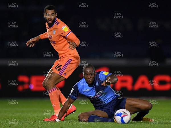 291220 - Wycombe Wanderers v Cardiff City - Sky Bet Championship - Uche Ikpeazu of Wycombe Wanderers holds off the challenge from Curtis Nelson of Cardiff City
