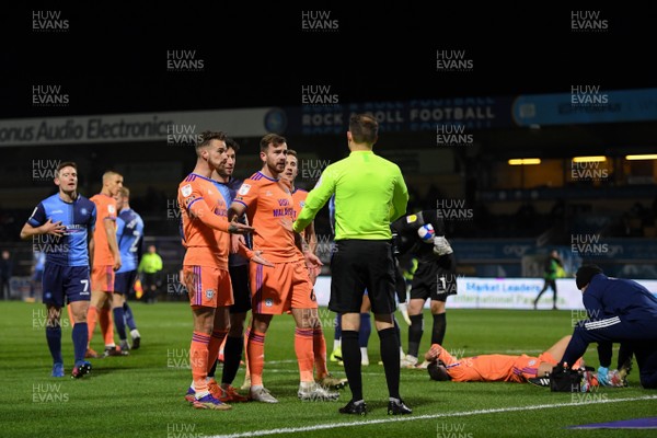 291220 - Wycombe Wanderers v Cardiff City - Sky Bet Championship - Joe Bennett of Cardiff City and Joe Ralls protest to Referee Leigh Doughty as Harry Wilson lies injured in the penalty area