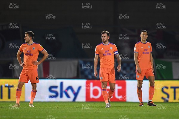 291220 - Wycombe Wanderers v Cardiff City - Sky Bet Championship - Will Vaulks of Cardiff City, Joe Ralls and Filip Benkovic dejected as Wycombe Wanderers score their 2nd goal
