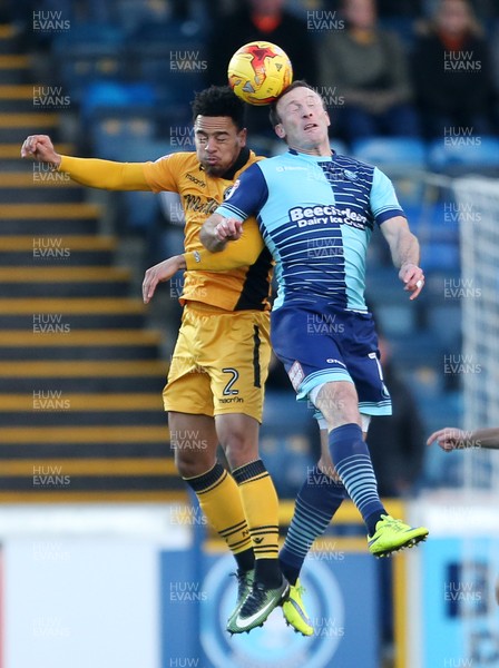 020117 - Wycombe Wanders v Newport County - SkyBet League Two - Jazzi Barnum-Bobb of Newport County and Garry Thompson of Wycombe Wanderers go up for the header by Chris Fairweather/Huw Evans Agency