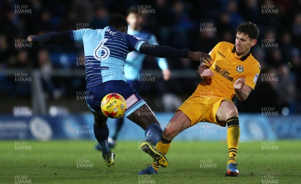 020117 - Wycombe Wanders v Newport County - SkyBet League Two - Mark Randall of Newport County tackles Aaron Pierre of Wycombe Wanderers to go on to score a goal by Chris Fairweather/Huw Evans Agency