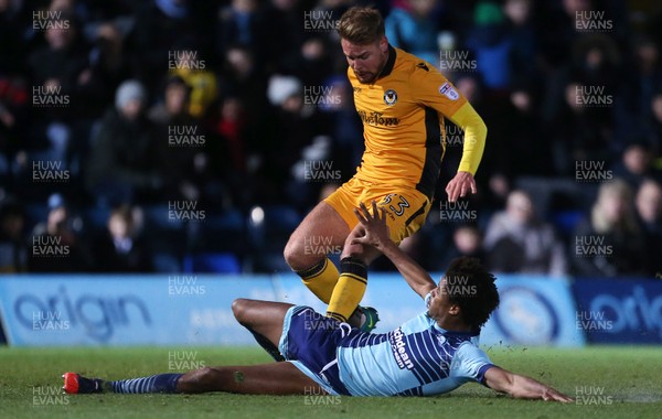 020117 - Wycombe Wanders v Newport County - SkyBet League Two - Jack Jebb of Newport County is tackled by Sido Jombati of Wycombe Wanderers by Chris Fairweather/Huw Evans Agency