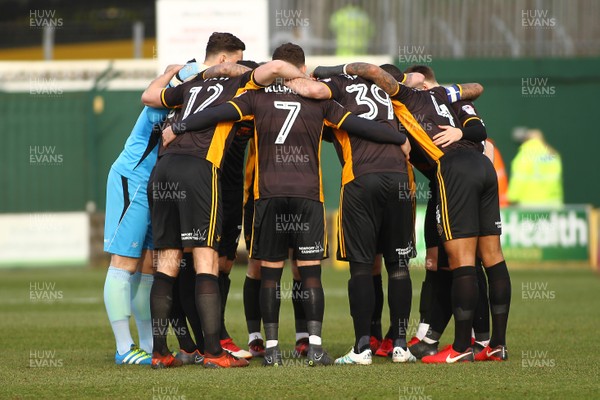 100318 - Yeovil Town v Newport County - EFL SkyBet League 2 - Players of Newport County huddle before kick off 