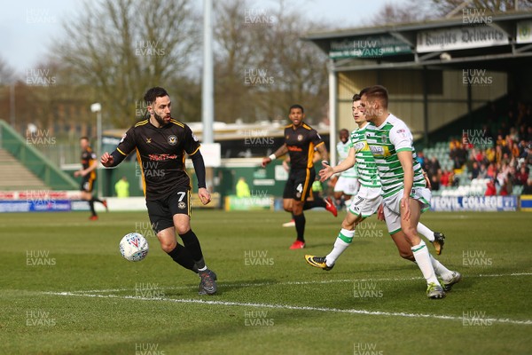 100318 - Yeovil Town v Newport County - EFL SkyBet League 2 - Robbie Willmott of Newport County takes on Ryan Dickson of Yeovil Town 