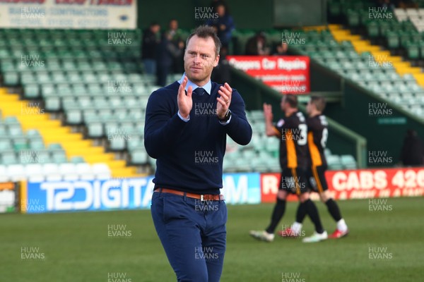 100318 - Yeovil Town v Newport County - EFL SkyBet League 2 - Manager of Newport County Michael Flynn celebrates with the traveling fans at the end of the game