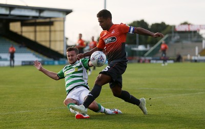 100718 - Yeovil Town v Swansea City - Pre Season Friendly - Wayne Routledge of Swansea City is tackled by Thomas James of Yeovil