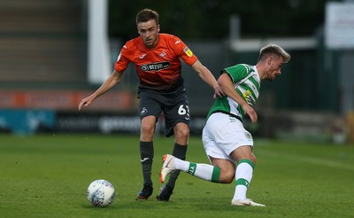 100718 - Yeovil Town v Swansea City - Pre Season Friendly - Ryan Blair of Swansea City is challenged by Alefe Santos D'Abadia of Yeovil