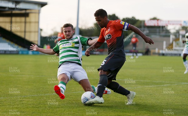 100718 - Yeovil Town v Swansea City - Pre Season Friendly - Wayne Routledge of Swansea City is tackled by Thomas James of Yeovil