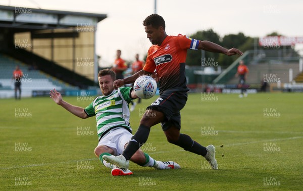 100718 - Yeovil Town v Swansea City - Pre Season Friendly - Wayne Routledge of Swansea City is tackled by Thomas James of Yeovil