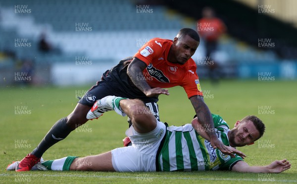 100718 - Yeovil Town v Swansea City - Pre Season Friendly - Luciano Nursing of Swansea City collides with Thomas James of Yeovil