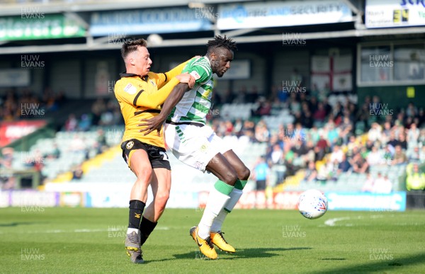 300319 - Yeovil v Newport County - SkyBet League 2 - Bevis Mugabi of Yeovil is tackled by Harry McKirdy of Newport County