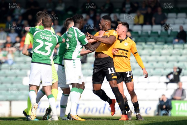 300319 - Yeovil v Newport County - SkyBet League 2 - Bevis Mugabi of Yeovil and Jamille Matt of Newport County clash