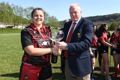 270425 - Ynysddu BG Ladies v Haverfordwest - Admiral Women's National League Championship - Ynysddu BG Ladies Captain, Emily Parker is presented the trophy by WRU rep Colin Wilks