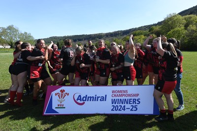 270425 - Ynysddu BG Ladies v Haverfordwest - Admiral Women's National League Championship - Ynysddu BG Ladies Captain, Emily Parker celebrates with her team as they lift the trophy