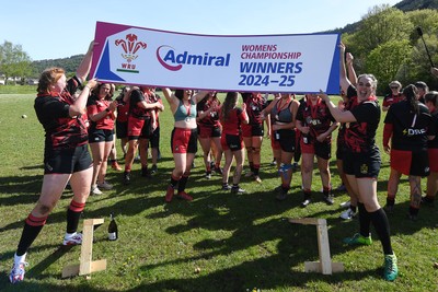 270425 - Ynysddu BG Ladies v Haverfordwest - Admiral Women's National League Championship - Ynysddu BG Ladies Captain, Emily Parker celebrates with her team as they lift the trophy