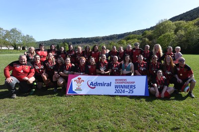 270425 - Ynysddu BG Ladies v Haverfordwest - Admiral Women's National League Championship - Ynysddu BG Ladies Captain, Emily Parker celebrates with her team as they lift the trophy