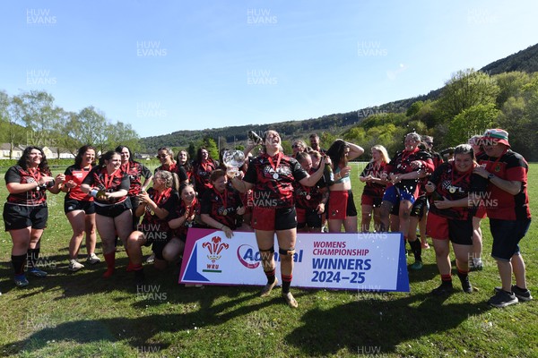 270425 - Ynysddu BG Ladies v Haverfordwest - Admiral Women's National League Championship - Ynysddu BG Ladies Captain, Emily Parker celebrates with her team as they lift the trophy