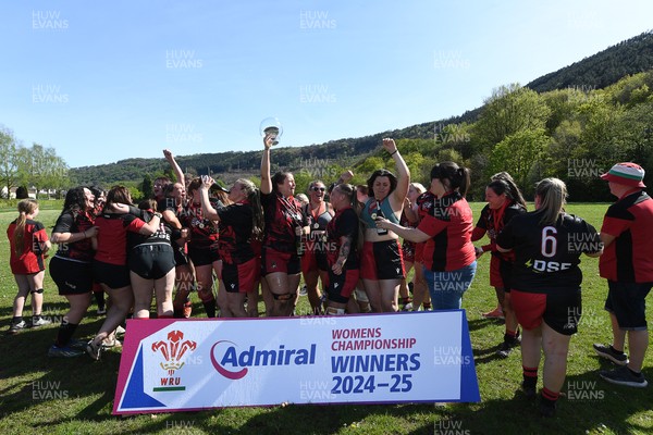 270425 - Ynysddu BG Ladies v Haverfordwest - Admiral Women's National League Championship - Ynysddu BG Ladies Captain, Emily Parker celebrates with her team as they lift the trophy