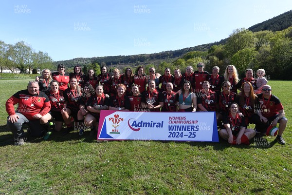 270425 - Ynysddu BG Ladies v Haverfordwest - Admiral Women's National League Championship - Ynysddu BG Ladies Captain, Emily Parker celebrates with her team as they lift the trophy