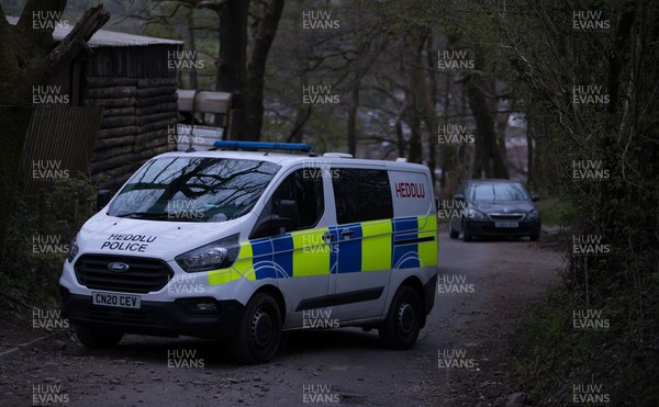 270421 Police at the scene of the fire damaged house where a body was found at Mill Road, Ynysybwl, near Pontypridd