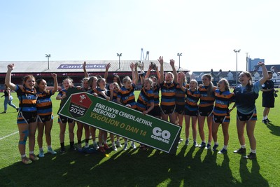 060525 - Ysfgol Bro Pedr v Bryncelynnog Comprehensive - Girls Schools U14s Cup Final - Both sides lift the trophy after the game ends in a draw