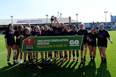 060525 - Ysfgol Bro Pedr v Bryncelynnog Comprehensive - Girls Schools U14s Cup Final - Both sides lift the trophy after the game ends in a draw