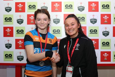 190324 - Ysgol Bryn Celynnog v Ysgol Godre’r Berwyn - WRU Welsh Schools Girls U12 Cup Final - Player of the Match Bryn Celynnog’s Emie George receives her medal from Kira Philpott