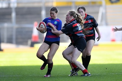 060525 - Ysgol Cwm Rhymni v Ysgol Bro Dur - Girls Schools U16s Cup Final - Summer Kingdom Barfoot of Ysgol Bro Dur is challenged by Beca Elms of Ysgol Cwm Rhymni