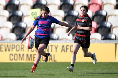 060525 - Ysgol Cwm Rhymni v Ysgol Bro Dur - Girls Schools U16s Cup Final - Isabelle Thomas of Ysgol Bro Dur kicks the ball to Milli Jenckins of Ysgol Bro Dur to score a try