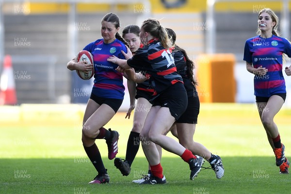 060525 - Ysgol Cwm Rhymni v Ysgol Bro Dur - Girls Schools U16s Cup Final - Summer Kingdom Barfoot of Ysgol Bro Dur is challenged by Beca Elms of Ysgol Cwm Rhymni
