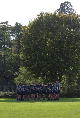 011025 - Ysgol Gyfun Gymraeg Glantaf v Coleg Gwent, WRU Welsh Schools & Colleges league - Ysgol Glantaf huddle up at the end of the match
