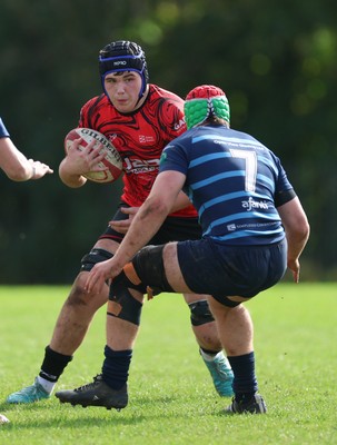 011025 - Ysgol Gyfun Gymraeg Glantaf v Coleg Gwent, WRU Welsh Schools & Colleges league - Jake Shepperd of Coleg Gwent takes on Alfie Prygodzicz of Ysgol Glantaf