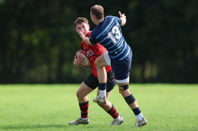 011025 - Ysgol Gyfun Gymraeg Glantaf v Coleg Gwent, WRU Welsh Schools & Colleges league - Tegwyn Mahoney of Coleg Gwent takes on Bailey Cutts of Ysgol Glantaf