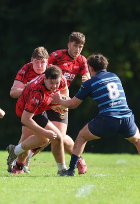 011025 - Ysgol Gyfun Gymraeg Glantaf v Coleg Gwent, WRU Welsh Schools & Colleges league - Morgan Suller of Coleg Gwent takes on Efan Jenkins of Ysgol Glantaf